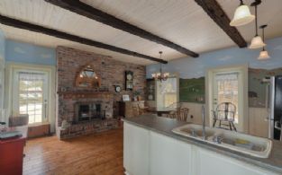 Kitchen with Fireplace in Breakfast Area - Country homes for sale and luxury real estate including horse farms and property in the Caledon and King City areas near Toronto