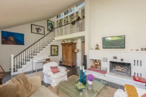 Family Room with 2-storey Fireplace - Country homes for sale and luxury real estate including horse farms and property in the Caledon and King City areas near Toronto