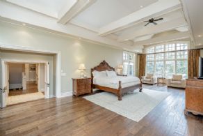 Master bedroom with vaulted ceiling and seating area - Country homes for sale and luxury real estate including horse farms and property in the Caledon and King City areas near Toronto
