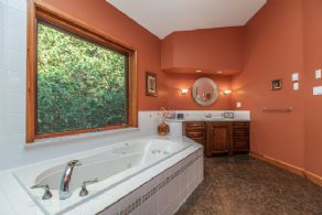 Large Jacuzzi Tub with Large Picture Window - Country homes for sale and luxury real estate including horse farms and property in the Caledon and King City areas near Toronto