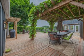Lushly shaded outdoor dining area - Country homes for sale and luxury real estate including horse farms and property in the Caledon and King City areas near Toronto