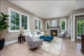 Family room with fireplace - Country homes for sale and luxury real estate including horse farms and property in the Caledon and King City areas near Toronto
