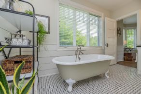 Soaker tub in primary bathroom - Country homes for sale and luxury real estate including horse farms and property in the Caledon and King City areas near Toronto