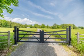 Entrance gate - Country homes for sale and luxury real estate including horse farms and property in the Caledon and King City areas near Toronto