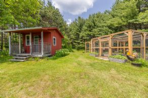 Bunkie alongside fenced veggie garden - Country homes for sale and luxury real estate including horse farms and property in the Caledon and King City areas near Toronto